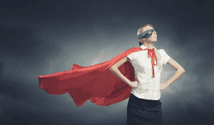 A Teacher Wearing A Superhero Costume, Standing With Her Hands On Her Hips, Showing That Teaching Is A Superpower.
